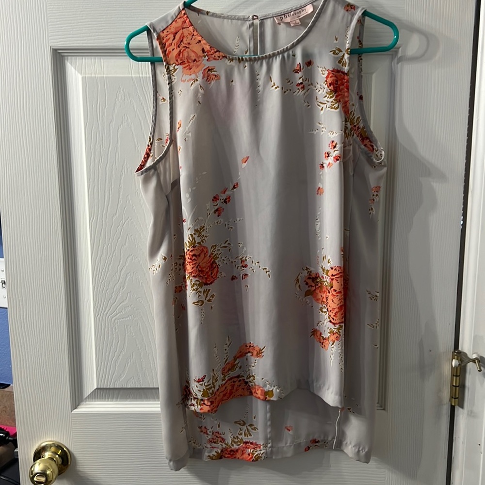 Cute high low sleeveless blouse